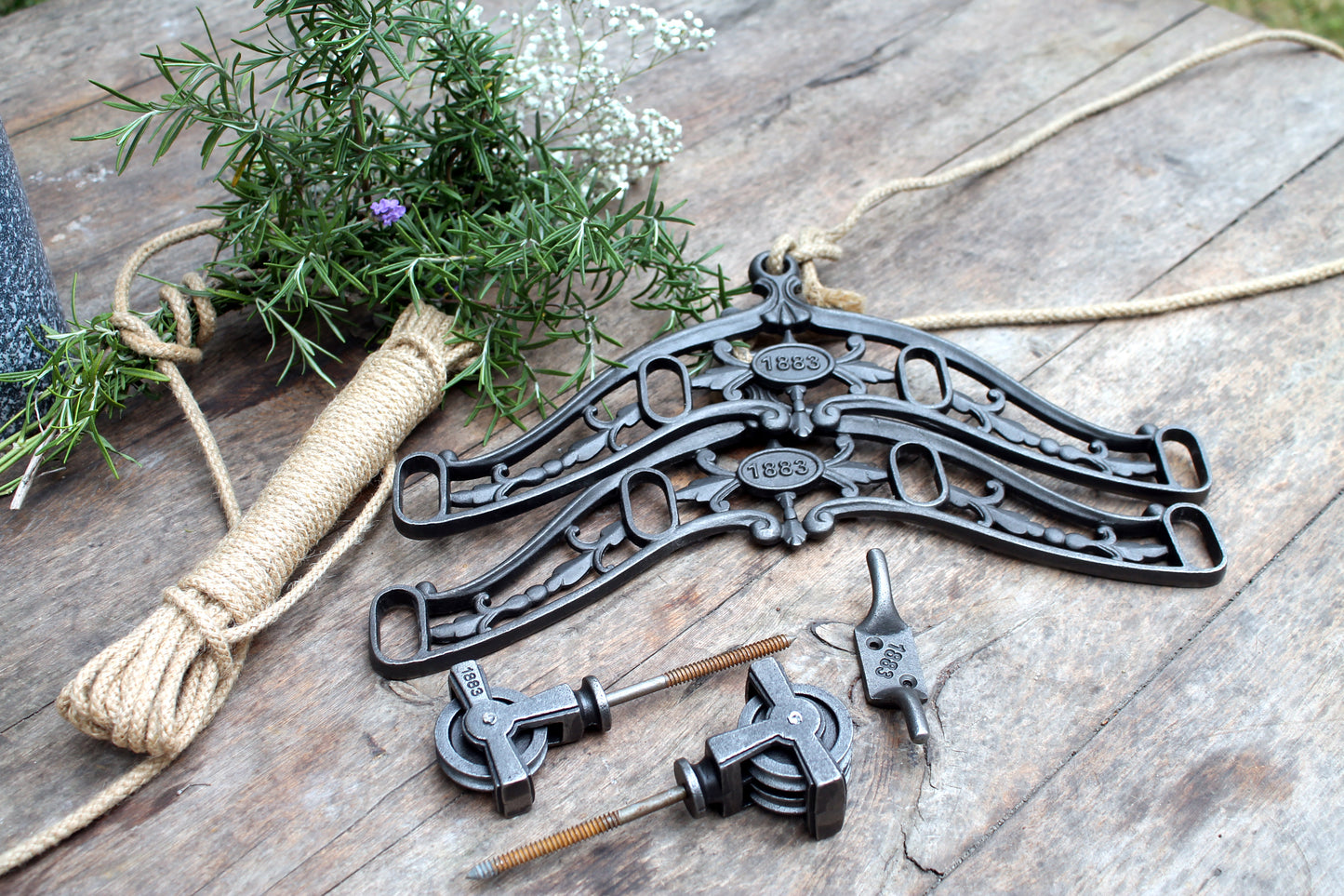 Eco-friendly vintage-style ceiling clothes airer parts, including handcrafted wooden rods, industrial black brackets, and heritage-inspired fittings