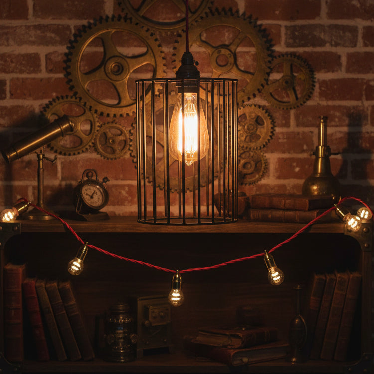 A steampunk metal lampshade against a brick wall