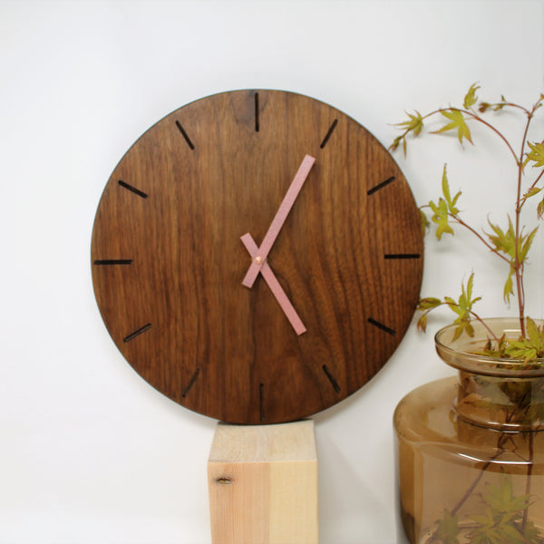 solid black walnut clock with baton marks and rose gold metal hands