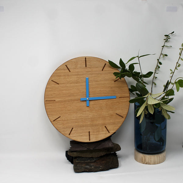 round wooden solid oak wall clock with turquoise hands