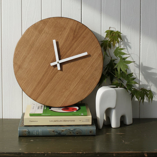 analog oak wood round clock with white metal hands