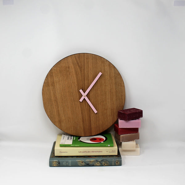scandi design wall clock with no numbers and pink hands