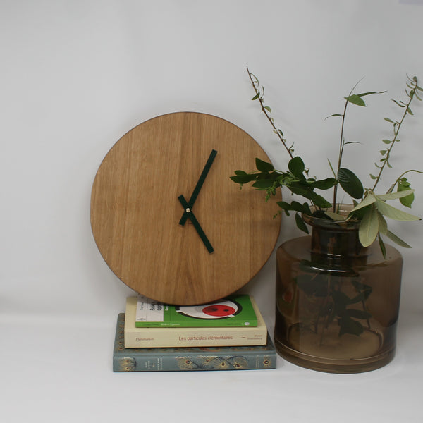 analog oak wall clock with dark green hands