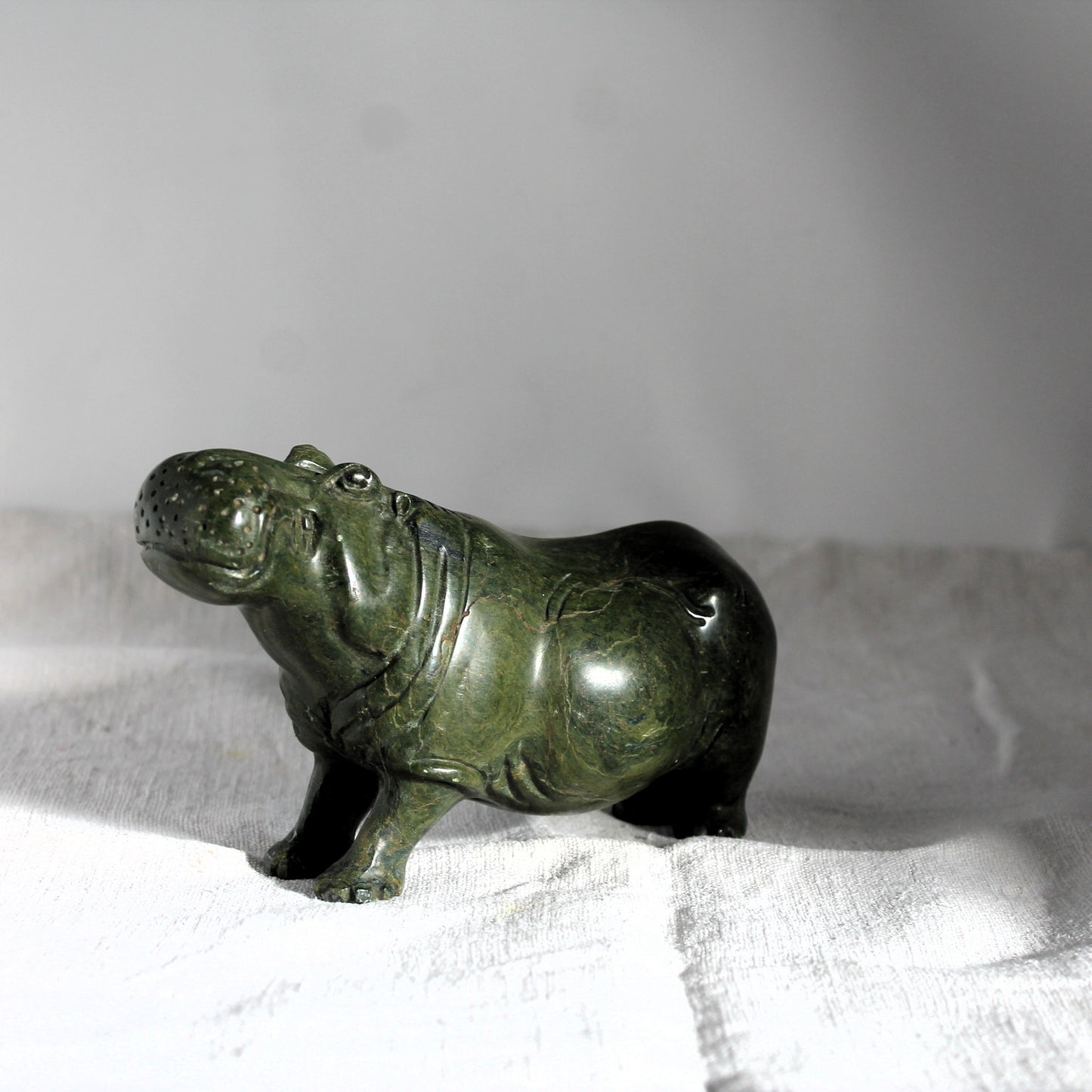Hippo stone ornament on a white background