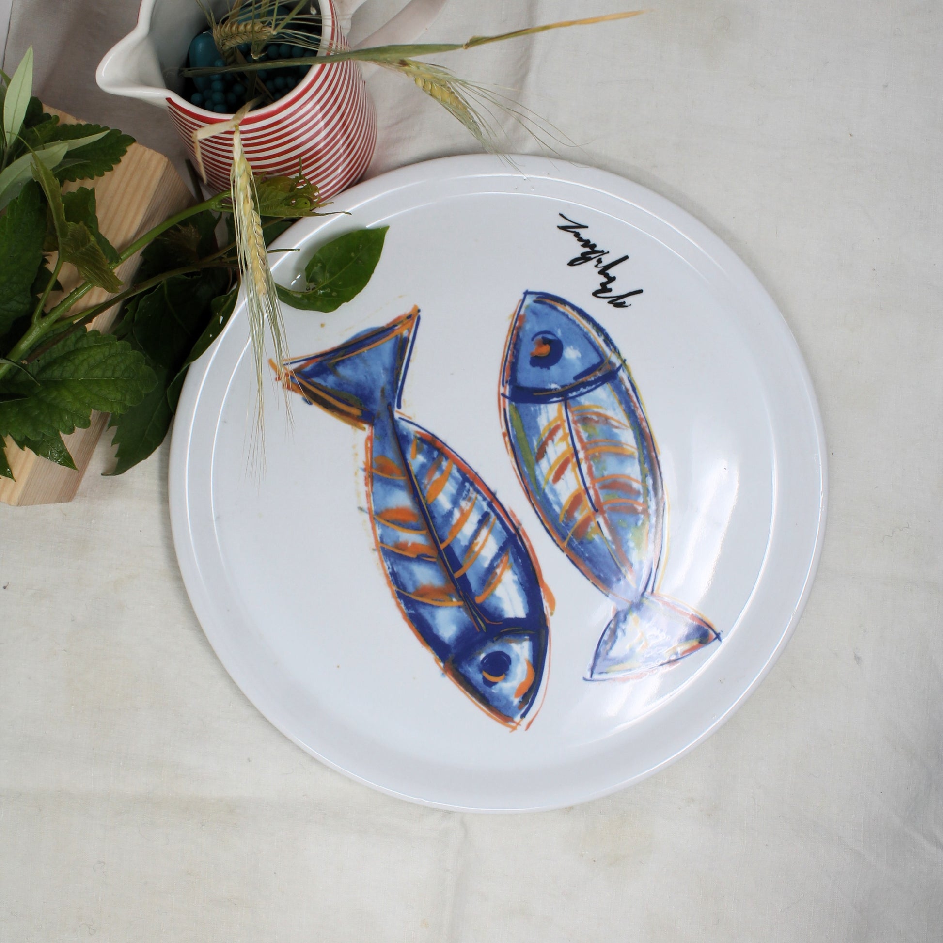 Italian kitchenware pizza platter with fish illustration