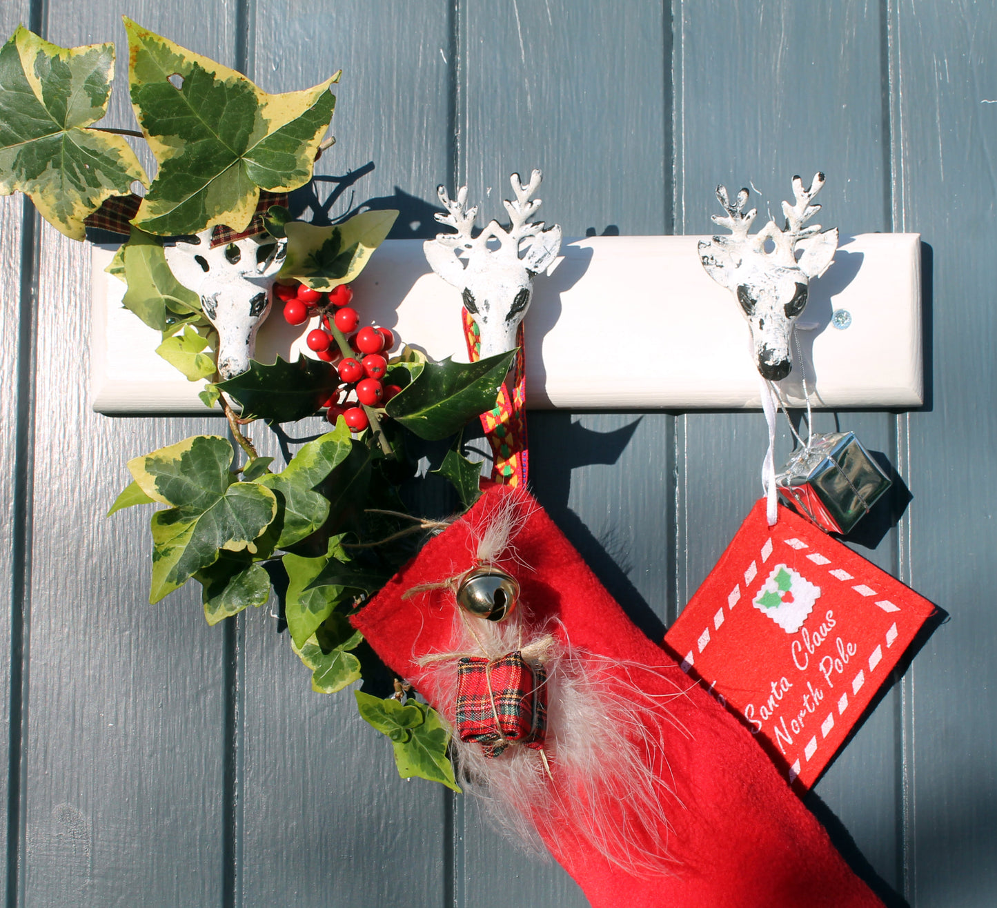 Reindeer head stocking hanger coat rack